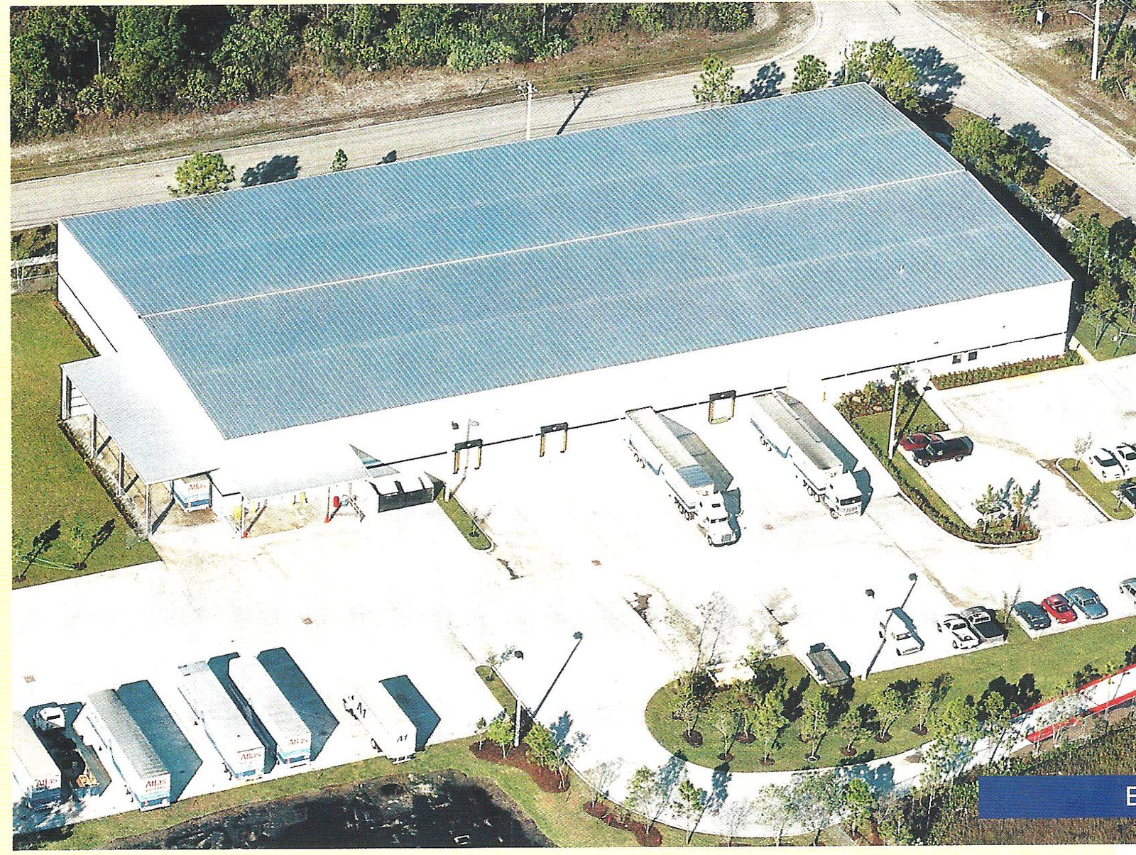 Aerial view of the A-1 Moving and Storage warehouse with trailers parked alongside