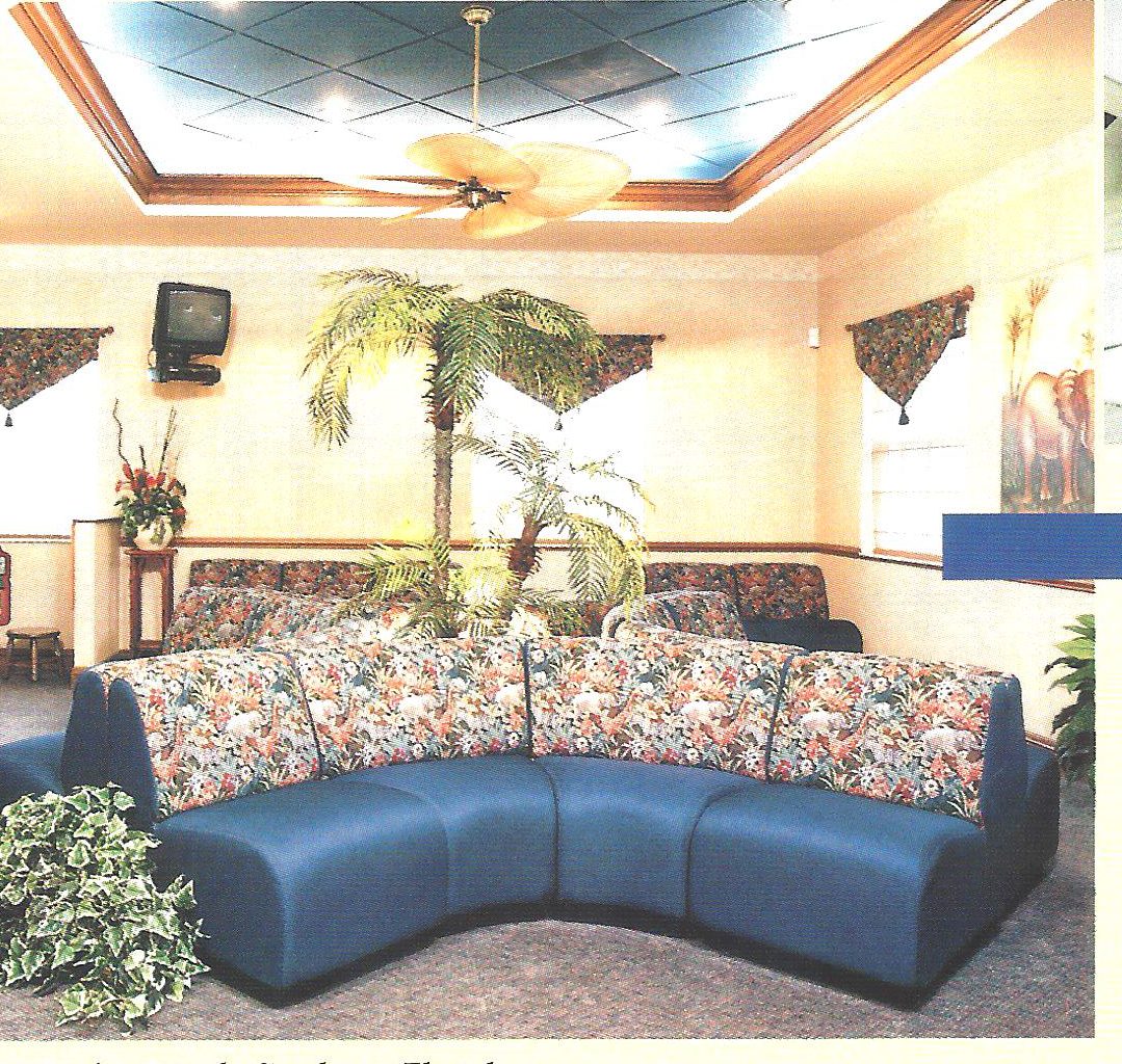 Waiting room with curved floral sofa