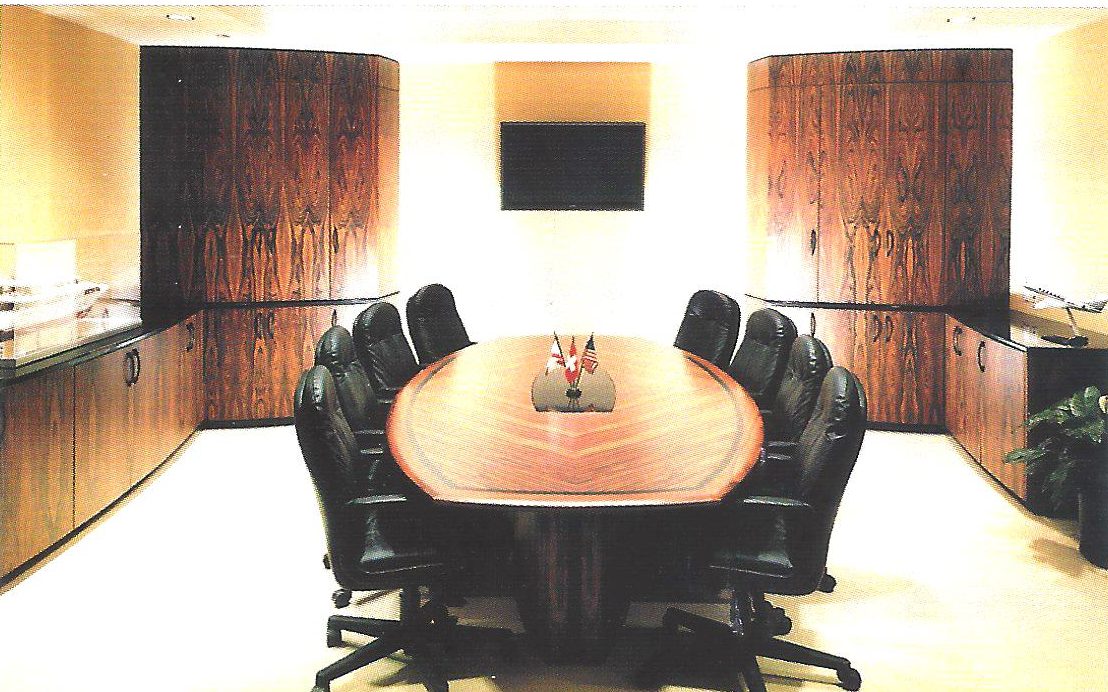 Conference room with long table and built-in cabinetry